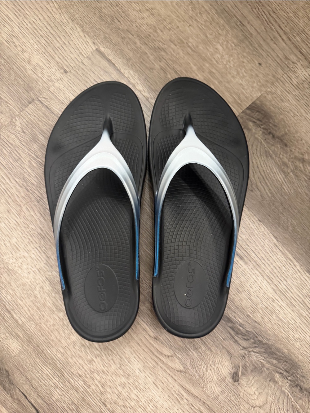 OOFOS Black Flip Flops with Gray and Blue Accents